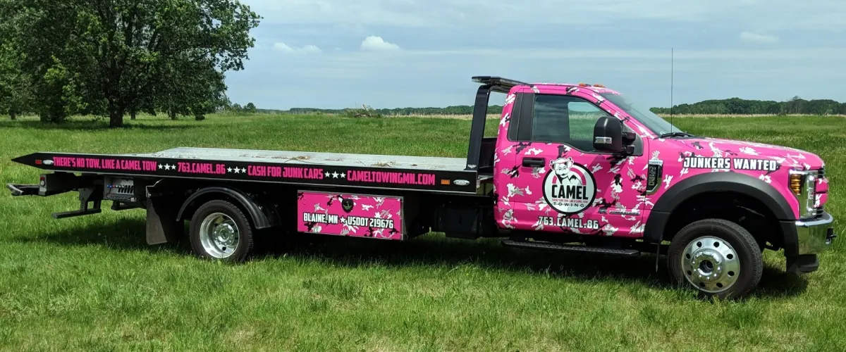 Camel Towing flatbed truck