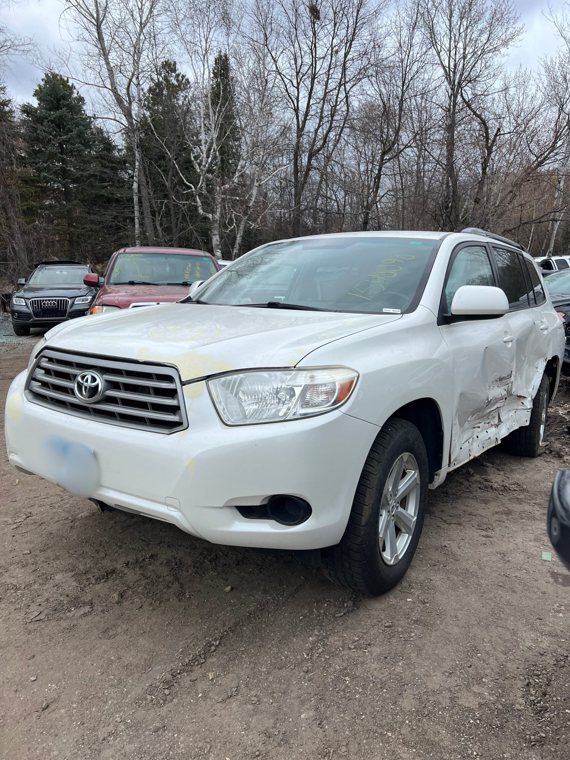 Tow truck picking up junk car in Ham Lake MN